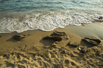 waves beach sand afternoon in Mytikas Preveza Greece