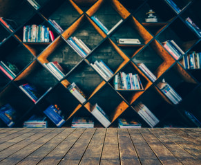 blurred Image many old books on bookshelf in library