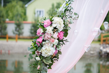 romantic and delicate decoration for wedding marriage ceremony in the open air