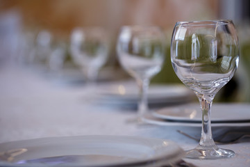 clean plates and glasses on festive table