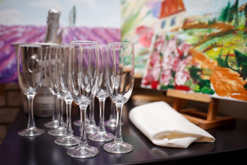 glasses of champagne stand on a table