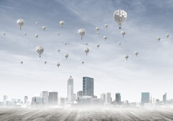 Concept of air pollution concept with aerostats flying above city