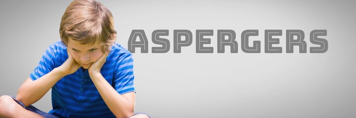 Boy against grey background with asperger's text