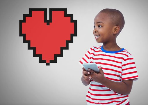 Boy against grey background with phone and pixel heart