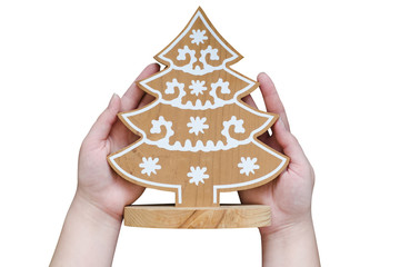 Woman's hands show christmas holiday handmade Christmas tree toy. Isolated.