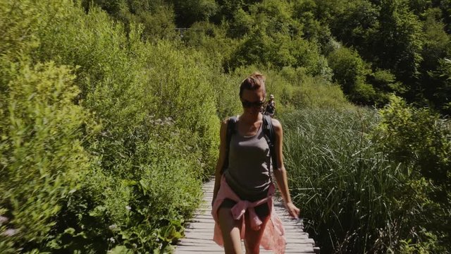 Woman visiting Plitvice Lakes National Park