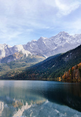 Fototapeta na wymiar Captivating scene of the snow rocky massif. Mountain with beautiful lake
