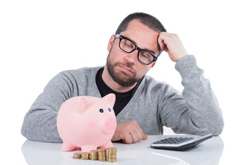 Man with piggy bank unsatisfied