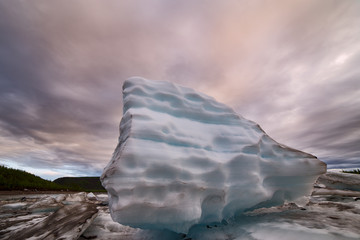 Remnants of ice in late spring. Spring on the Indigirka. Yakutia.