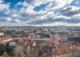 Naklejka na ściany i meble Prague Cityscape with Vibrant Clouds 