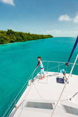 Fototapeta premium Little boy at luxury yacht
