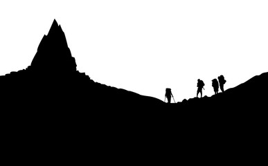 Silhouettes if Mountaineers standing under the Mountain