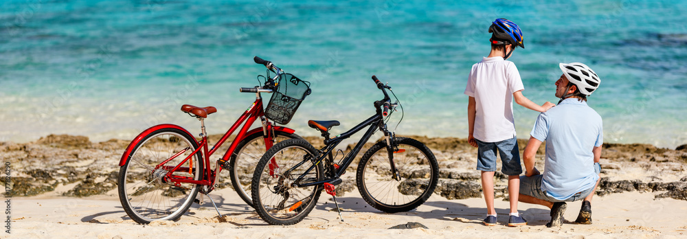 Canvas Prints father and kids at beach with bikes