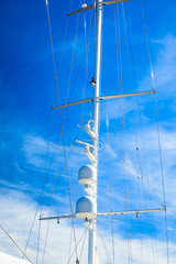 Detailed closeup of mast rigging top on sail boat