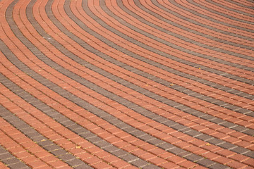 Round sidewalk pavers red and grey