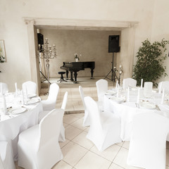 Many wedding chairs and tables