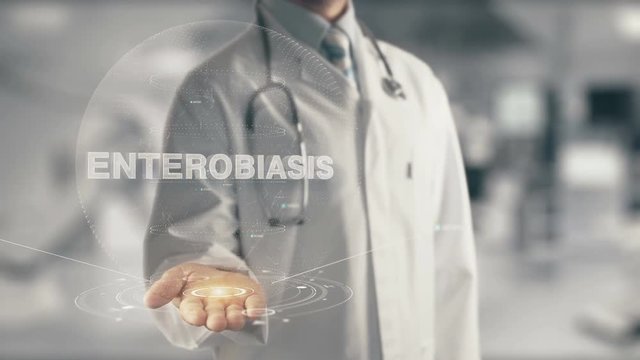 Doctor Holding In Hand Enterobiasis