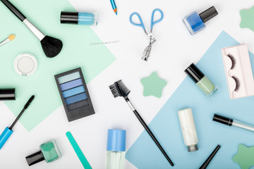 set of professional decorative cosmetics, makeup tools and accessory on white background. beauty, fashion, party and shopping concept. trendy flat lay composition, top view