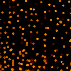 Beautiful Holiday Background with Golden bokeh lights.