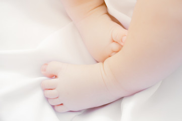 Top view of feet of newborn child. Concept of childbirth, medecine and gynecology