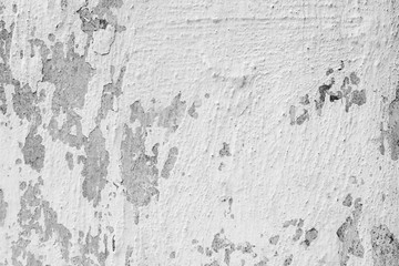 Wall fragment with scratches and cracks
