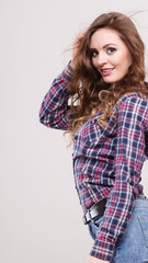 Attractive woman wearing checkered shirt