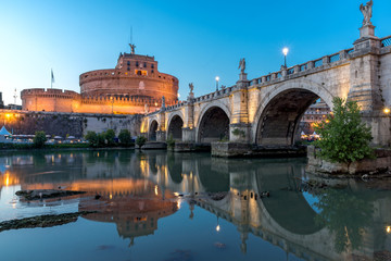Amazing Sunset view of St. Angelo Bridge and castle st. Angelo in city of Rome, Italy