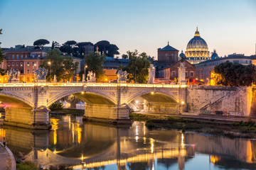 Amazing Sunset view of Tiber River and St. Peter's Basilica in Rome, Italy