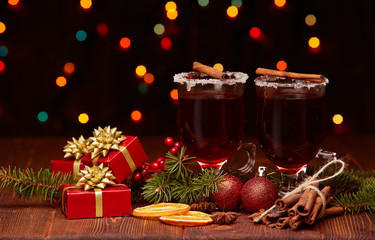 Glasses of mulled wine on wooden table
