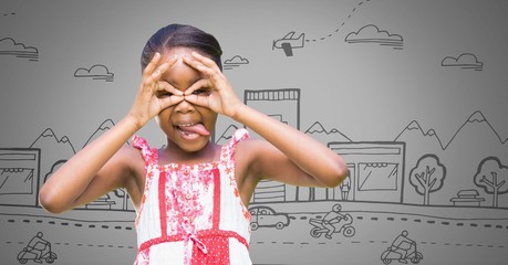 Girl against grey background with hands gesture of binoculars
