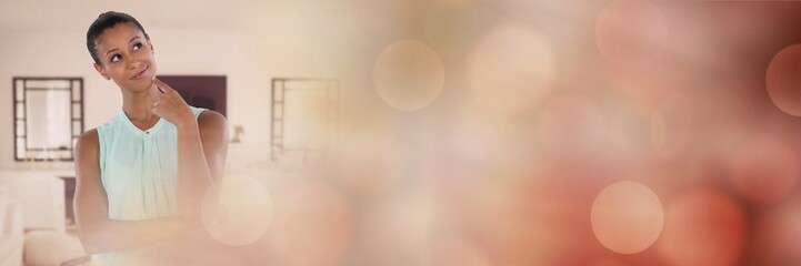 Businesswoman thinking at home with sparkling transition