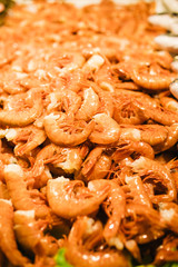 Close Up Fresh Shrimps On Display On Ice On Fishermen Market Store Shop. Shrimps.