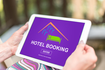 Hotel booking concept on a tablet