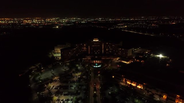 Lateral aerial video Rosen Shingle Creek Orlando at night 4k