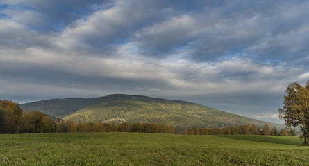 Fototapeta na wymiar Cerna hill and autumn evening in Krkonose mountains