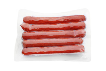 Packed sausages on white background