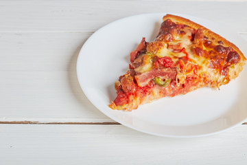 Top view of Italian rustic one slice pizza