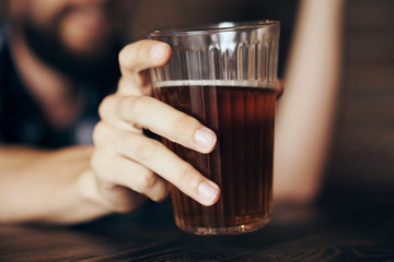 hand, glass with liquid close-up, male