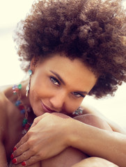 Sensual african american woman wearing jewelry