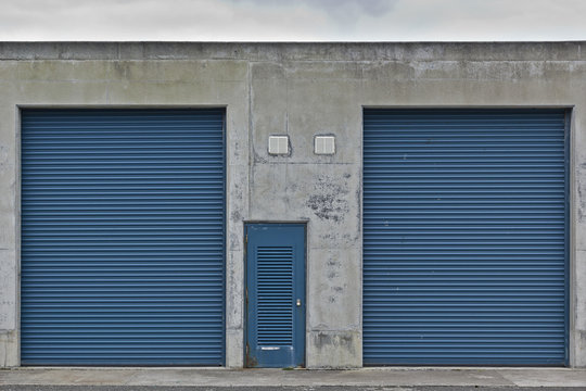 Closed blue gates to a storage area