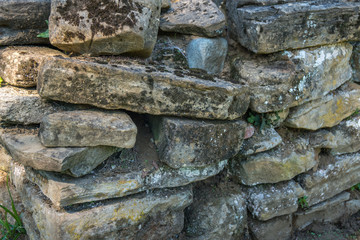 Old stone wall with moss and lichen