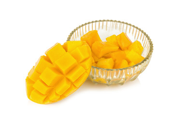 yellow mango. slice. cube. cube mango in glass.  isolated on white background