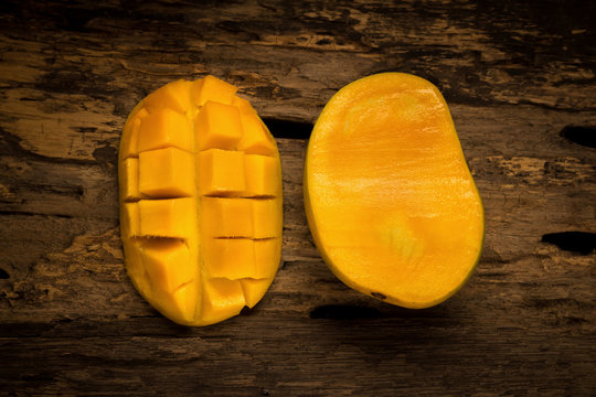 mango on a dark wood background