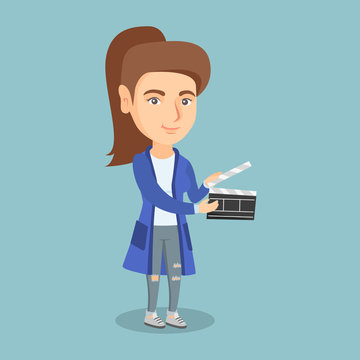 Young caucasian woman holding a camera slate for the filming. Smiling woman holding an open clapperboard. Woman holding a blank movie clapperboard. Vector cartoon illustration. Square layout.