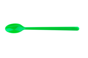 green spoon plastic isolated on white background