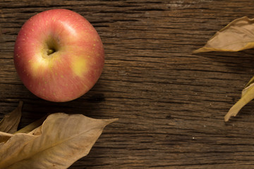 apple on old wooden. morning