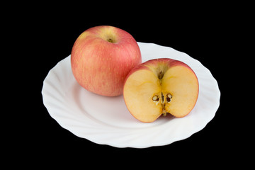 apple on black background. dish
