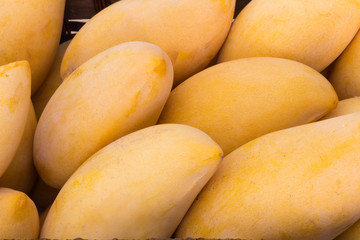 mango in basket on table vintage