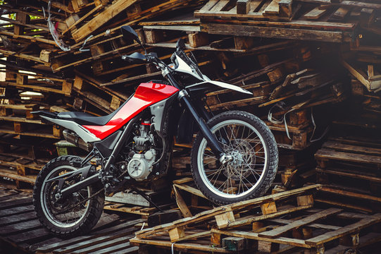 motorcycle enduro on wooden pallets, freedom and extreme