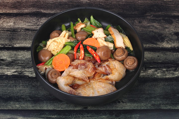 Fried big noodle topped mixed vegetables for organic food.